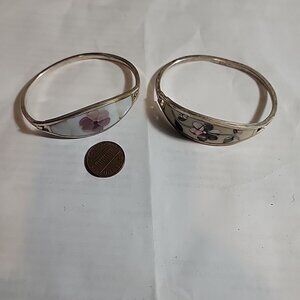2 sterling silver bracelets with floral enlay